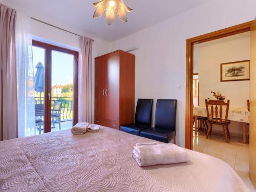 Postel nebo postele na pokoji v ubytování Apartment Alba-5 by Interhome