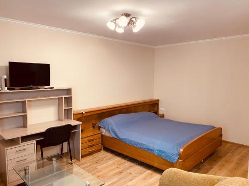 Postel nebo postele na pokoji v ubytování Appartament Karja 26A/10