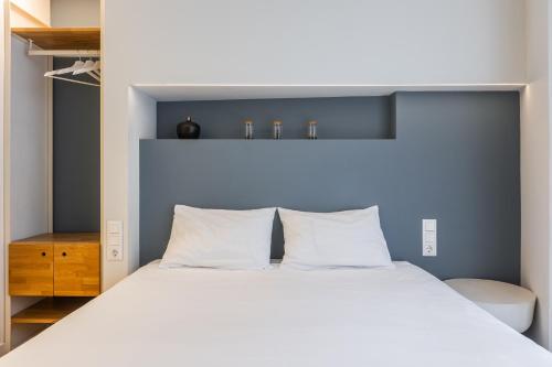 Posteľ alebo postele v izbe v ubytovaní Syntagma Apartments by Olala Homes