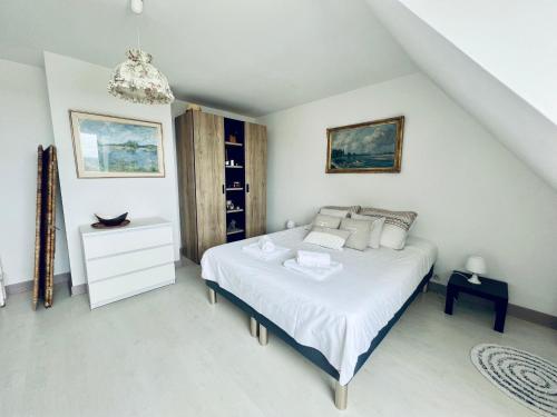 Postel nebo postele na pokoji v ubytování Le Manamour, style Appart Hôtel à 10 min de Nevers