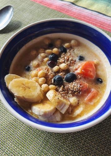 a bowl of soup with fruit and vegetables in it at Casa Vitall in Líbano