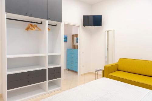 Ένα ή περισσότερα κρεβάτια σε δωμάτιο στο D&D Home