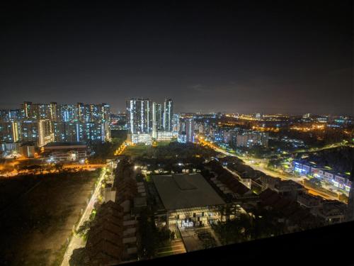 a night view of a city with lights at Tamarind Suites or D'Pulze Residence or Domain NeoCyber, click Room selection for location and pics in Cyberjaya