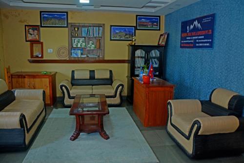 a waiting room with couches and a coffee table at Hotel Himalayan Home Lamagaun Pokhara 10 minute drive from tourist place lakeside rent Rooms in Pokhara