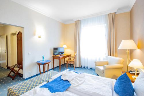 Postel nebo postele na pokoji v ubytování SeeHotel Großräschen