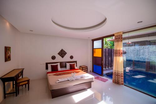 Ένα ή περισσότερα κρεβάτια σε δωμάτιο στο Pool villa 4 bedroom