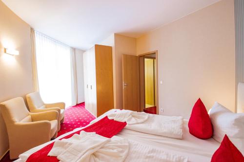 Postel nebo postele na pokoji v ubytování SeeHotel Großräschen