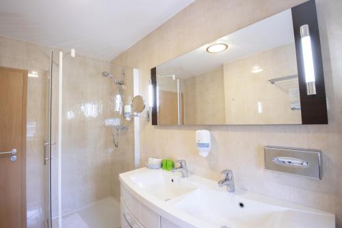 Koupelna v ubytování SeeHotel Großräschen