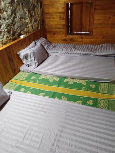 Katil atau katil-katil dalam bilik di Triệu Chương Homestay