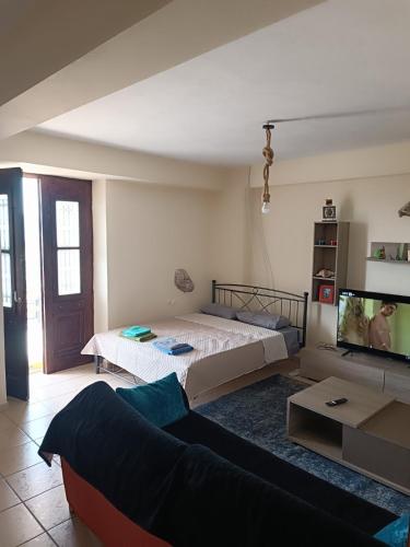 Postel nebo postele na pokoji v ubytování Zorbas House
