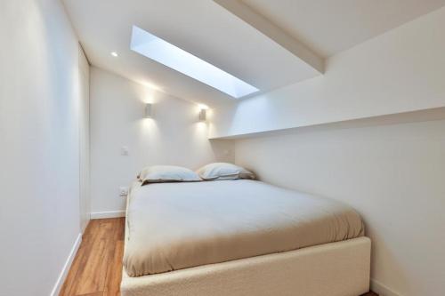 Llit o llits en una habitació de Vieux Nice - Wifi, AC, 2 pers
