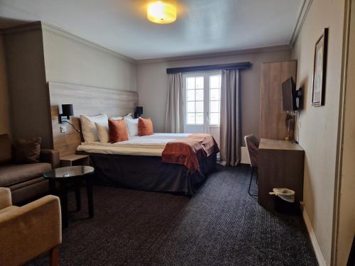 Katil atau katil-katil dalam bilik di Dr. Holms Hotel