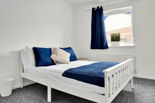 Ένα ή περισσότερα κρεβάτια σε δωμάτιο στο Serviced accomodation - For Families or Corporate