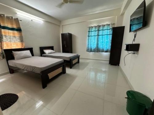 Postel nebo postele na pokoji v ubytování SS Happy Home's PG/Paying Guest