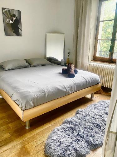 Posteľ alebo postele v izbe v ubytovaní Chambre double Montreux centre vue lac