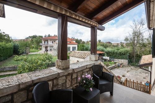 a patio with a view of a house at #914 Home - Irpinia in Nusco