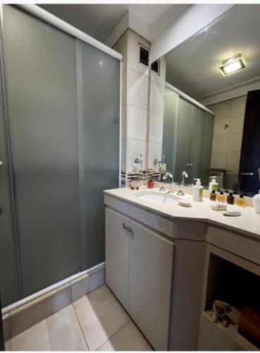 a bathroom with a sink and a shower at Mirador Yerba Buena in Yerba Buena