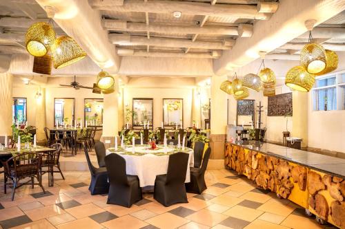 Restoran või mõni muu söögikoht majutusasutuses Forest Cottages