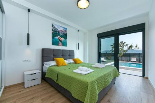 Ένα ή περισσότερα κρεβάτια σε δωμάτιο στο Villa Olea