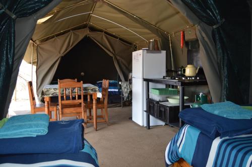 Kuchyň nebo kuchyňský kout v ubytování Thorn Tree Bush Camp