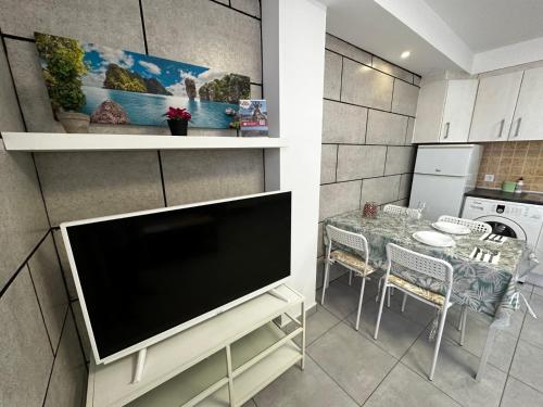 TV a/nebo společenská místnost v ubytování Edificio Prieto VIV N1