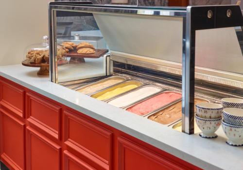 a counter with some food on top at Le Meridien Tampa, The Courthouse in Tampa