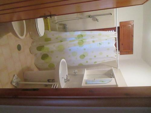 a bathroom with a sink and a mirror at Casa Velina in Castelnuovo Cilento