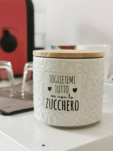 a container sitting on top of a counter at Room in shared apartment, near Lecco in Calolziocorte