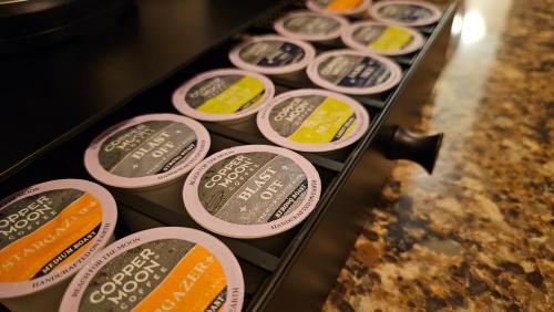 a drawer full of packets of butter on a counter at Daniell Manor in Laurium