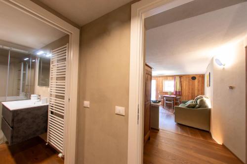 a hallway of a home with a living room at La Noix - Alloggi ad uso turistico - VDA - ARVIER - n 0041 e n 0042 in Arvier