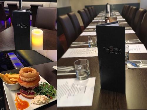 un lungo tavolo con un piatto di cibo su un tavolo di Kings Park Hotel a Glasgow