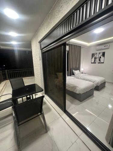Ένα ή περισσότερα κρεβάτια σε δωμάτιο στο cozy home near all services 20