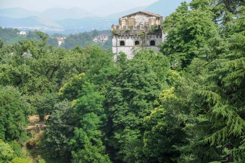 an old castle in the midst of trees at Hotel La Villa in Ceccano