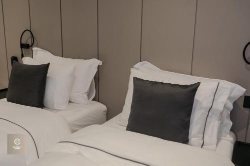 Letto o letti in una camera di Central Inn Hotel