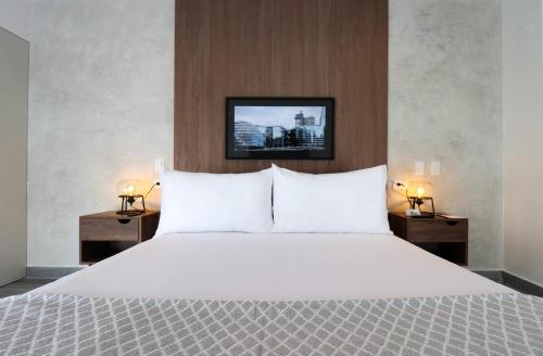 Postel nebo postele na pokoji v ubytování Captivating 1BR with Balcony in Miraflores