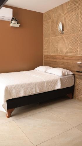 Ένα ή περισσότερα κρεβάτια σε δωμάτιο στο Marakos Pimentel