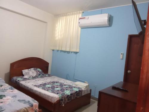 Ein Bett oder Betten in einem Zimmer der Unterkunft Emmanuel&Cavita