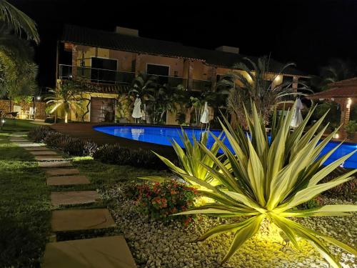 Bazén v ubytování Pousada Refúgio Jardim de Canoa by Borboleta nebo v jeho okolí