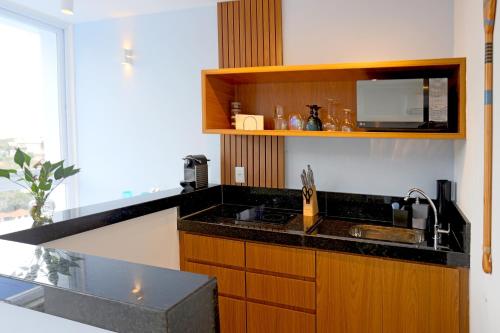 Una cocina o zona de cocina en Pousada Santorini