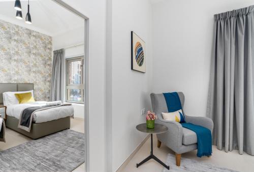 Ένα ή περισσότερα κρεβάτια σε δωμάτιο στο Amazing BeachFront Apartments near Atlantis Waterpark by Simply Comfort Sarai Palm Jumeirah
