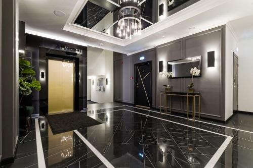 Televisyen dan/atau pusat hiburan di Loft Black and Red