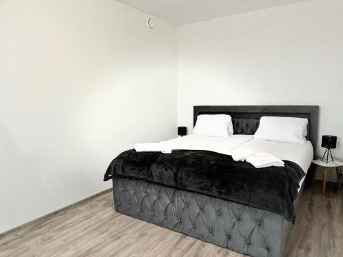 Ένα ή περισσότερα κρεβάτια σε δωμάτιο στο Sky apartments 508