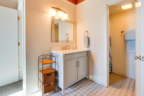a bathroom with a sink and a mirror at Mtn-View Condo with Community Perks in Silverthorne in Silverthorne