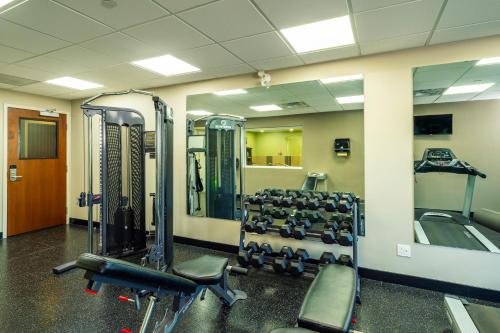 a gym with rows of treadmills and machines at Comfort Inn & Suites in Terrace