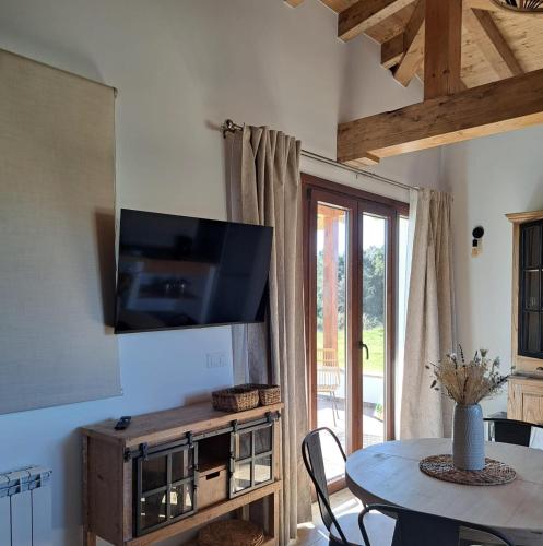 Μια τηλεόραση ή/και κέντρο ψυχαγωγίας στο Terradeva Apartamentos