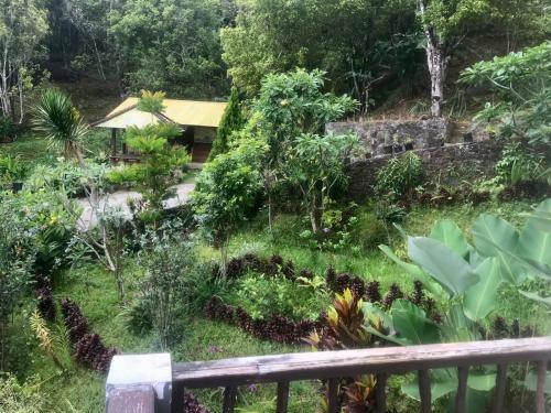 a garden from the balcony of a house at Munduk Sena in Munduk