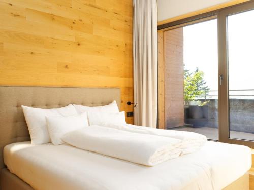 מיטה או מיטות בחדר ב-My Heimat 1495 Arlberg