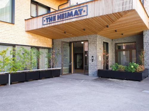a entrance to a building with a sign that reads star inn at Apartment in Schröcken near Ski Arlberg in Schröcken