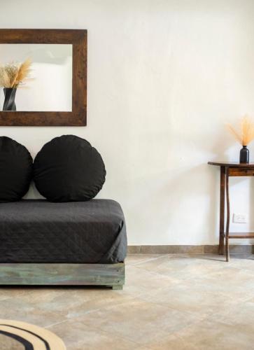 Χώρος καθιστικού στο Sonido del mar Hotel Boutique & Yoga Loft