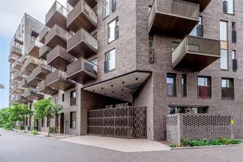 a building with balconies on the side of it at The maud luxury garden in London